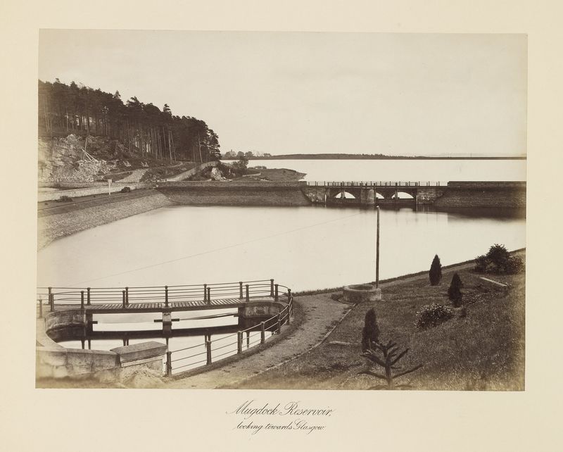 A Victorian album photograph of Mugdock Reservoir, with railings and a footbridge in the foreground and still water stretching towards Glasgow